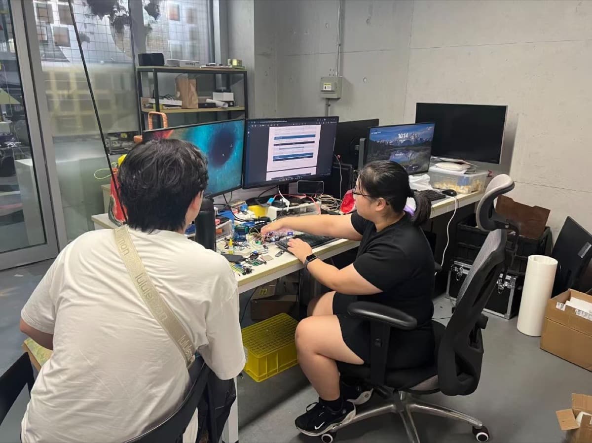 Engineering team developing electronics and firmware for a smart fire extinguisher training device